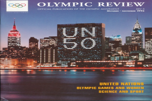 Ein Buch mit dem Titel "Olympische Spiele - Offizielle Veröffentlichung der Olympischen Bewegung" liegt auf einer flachen Oberfläche, das Cover zeigt eine Stadtlandschaft mit Gebäuden, Lichtern und Wasser, sowie den Text "Olympische Spiele der Vereinten Nationen und Frauen Wissenschaft und Sport"