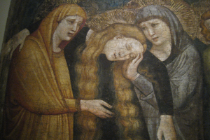 Ein abstraktes Gemälde mit verschiedenen Formen und Farben auf einer Leinwand.