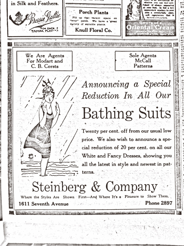 Eine Frau in einem weißen hochgeschlossenen Kleid mit langen Ärmeln und einem Dutt, umgeben von Text in einer Steinberg & Company-Badeanzugwerbung.