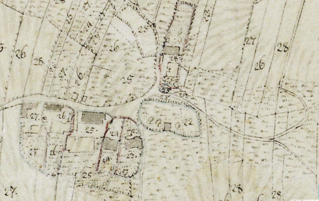 Detailierte alte Stadtkarte mit Gebäuden, Straßen und Text sowie einem Vorschlag für eine Entwicklung am unteren Rand.